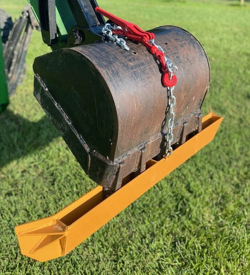 Gradeblade squeegee blade mounted to a bucket